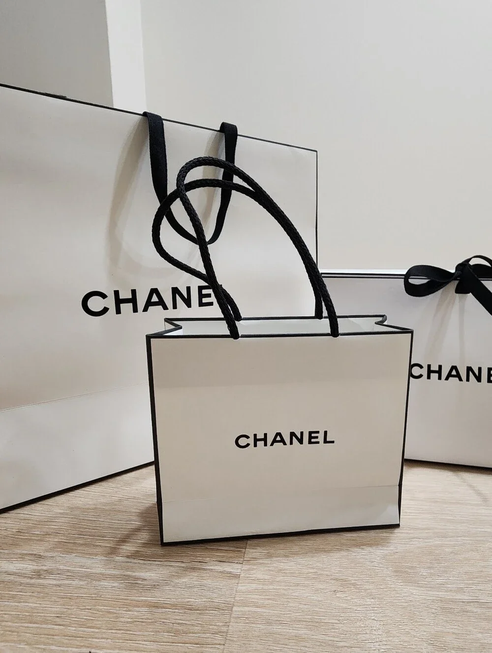 AUTHENTIC 3 piece CHANEL gift bag, triangular folding clutch, mini gift bag